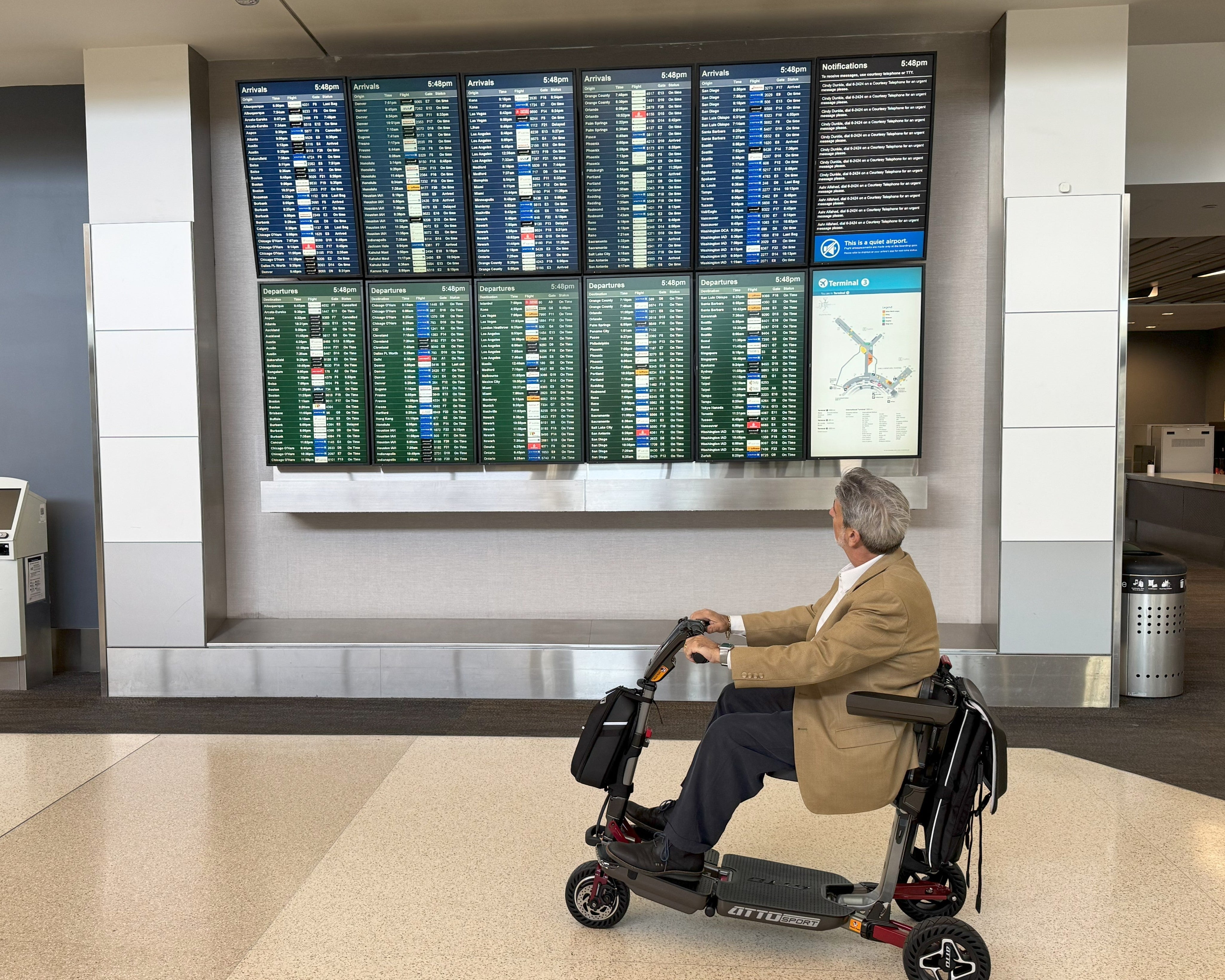 Traveling in an airport with a mobility scooter