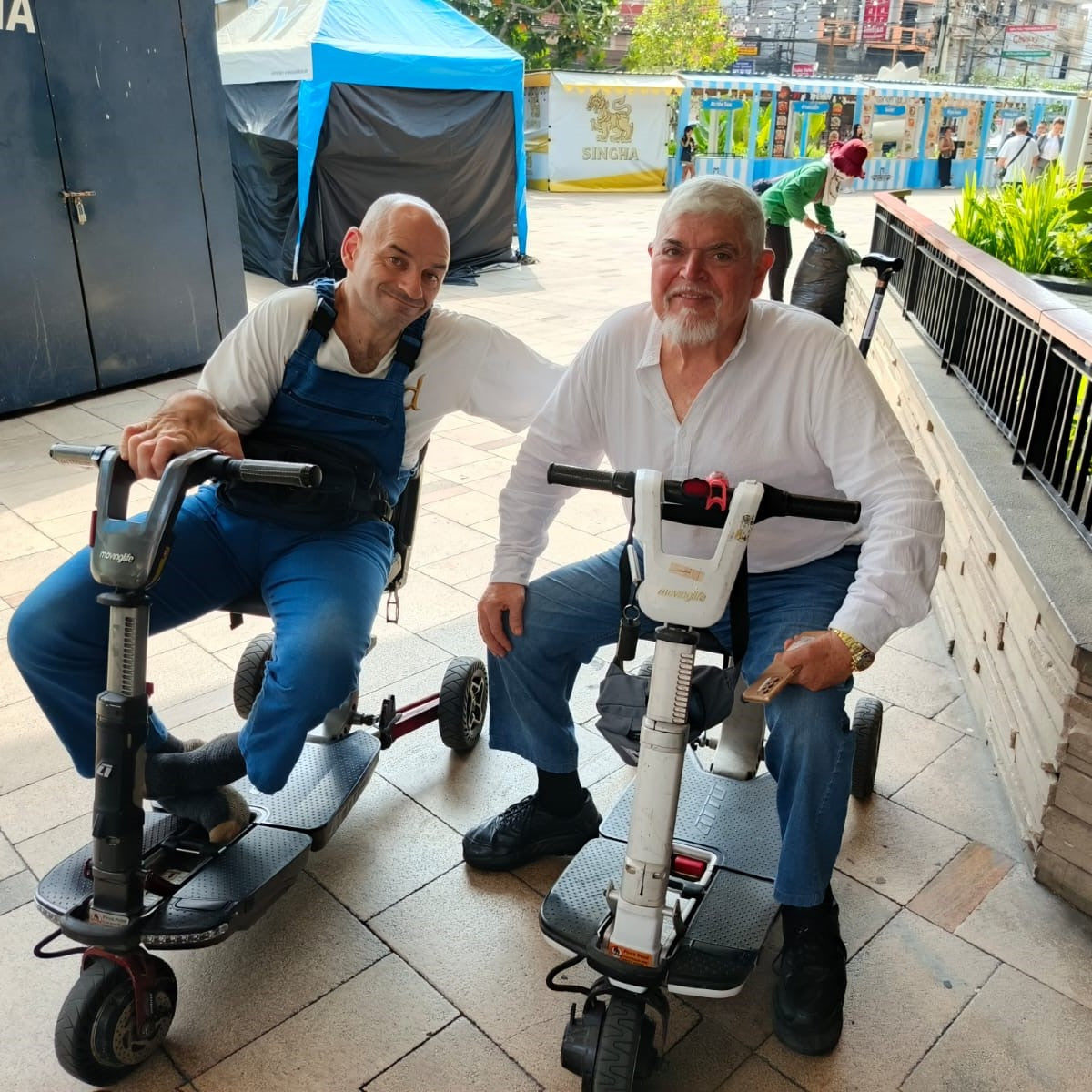 ATTO folding mobility scooters out for a drive while travelling