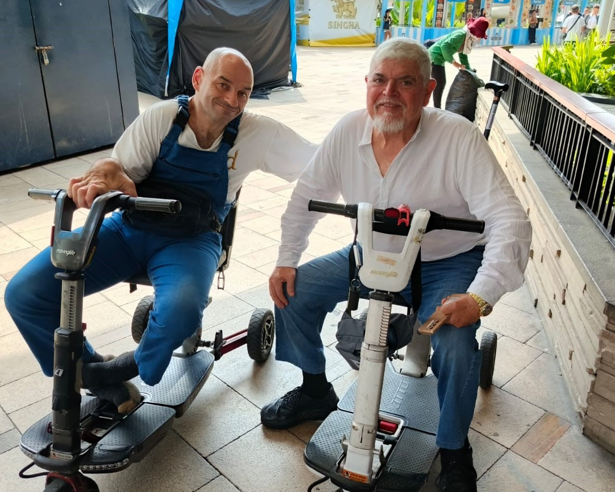 ATTO folding mobility scooters out for a drive while travelling